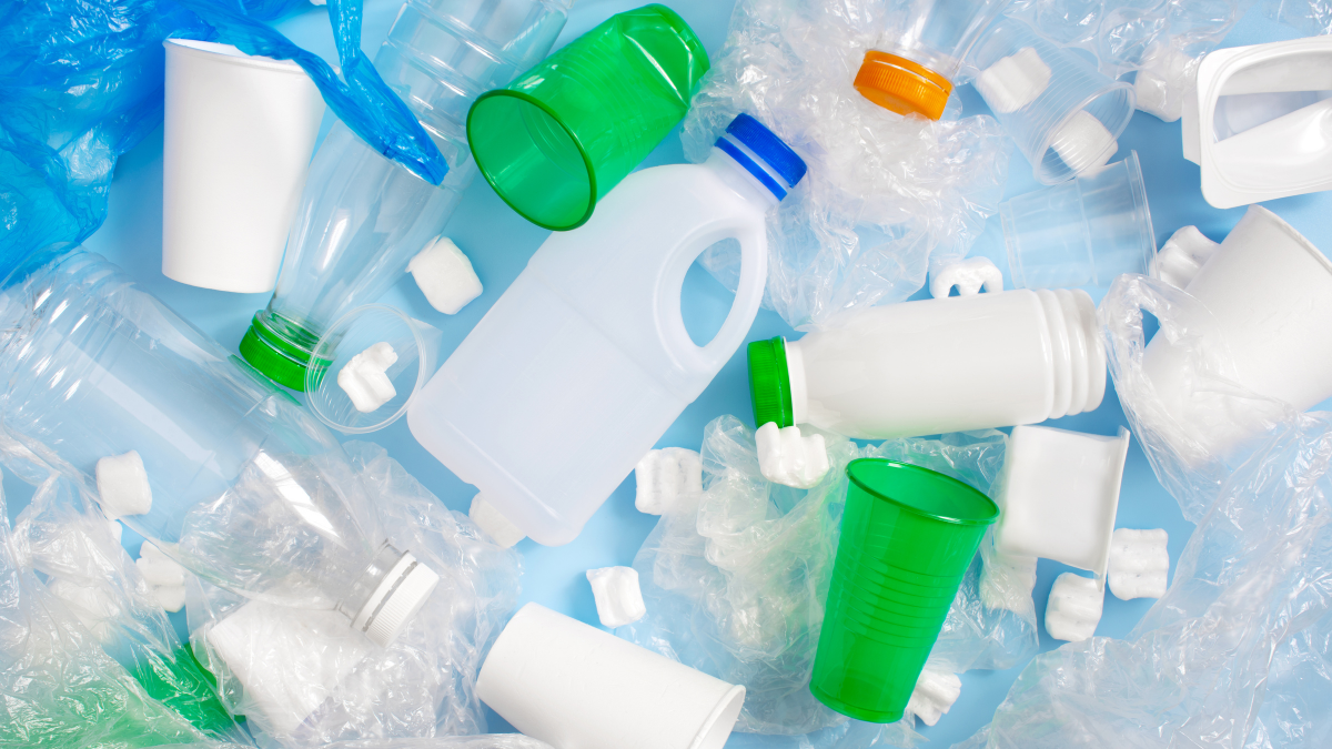 White and Green plastic bottles and cups