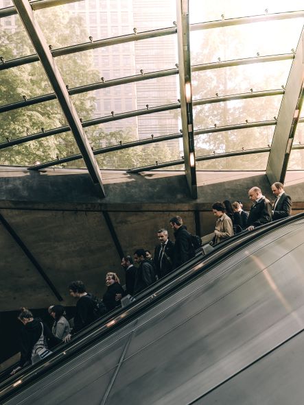 building with clear roof and escalator