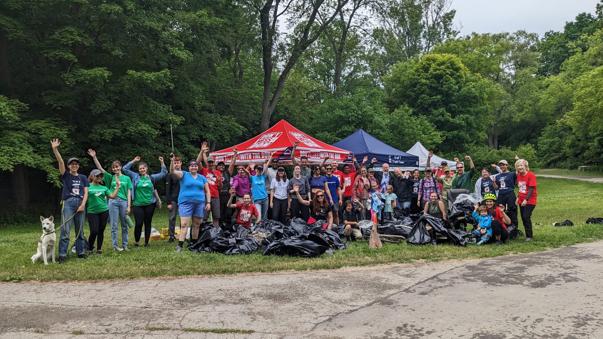 A group shot from a shoreline cleanup at Taylor Creek